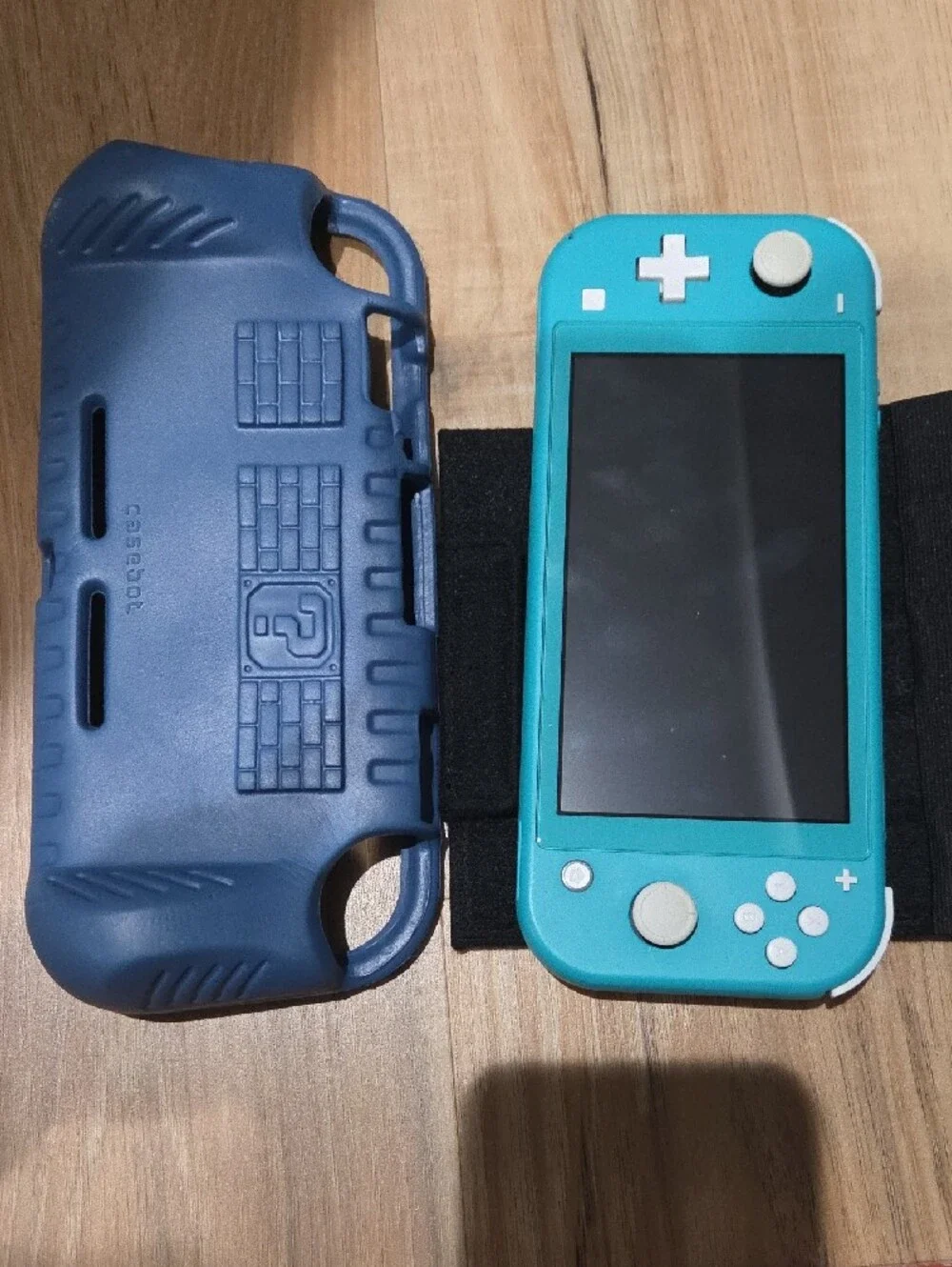 Nintendo Switch Lite Turquoise with Zelda Carry Case and Game Bundle